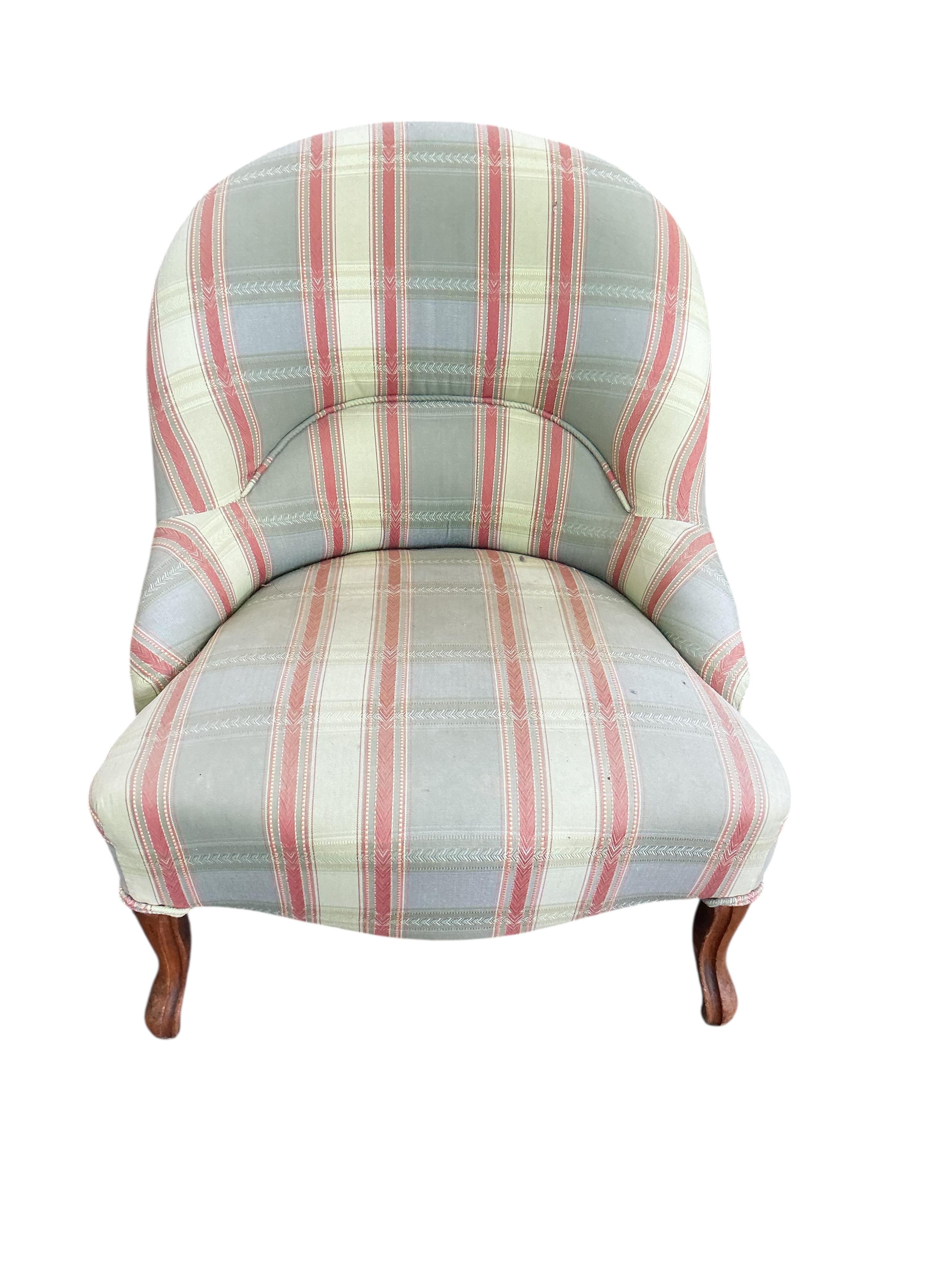 A pair of late 19th century upholstered mahogany nursing chairs, width 58cm, depth 50cm, height 70cm